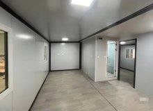 Modern modular container home exterior with steel structure