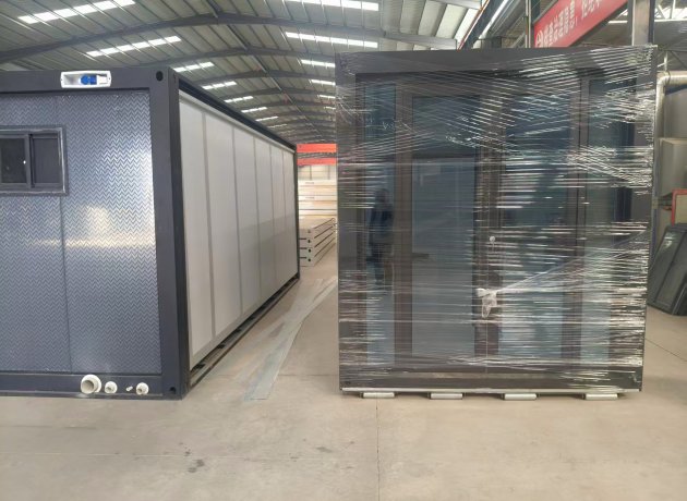 Modular container home with large panoramic windows