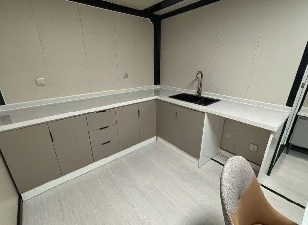 Container house interior with modern kitchen and living space