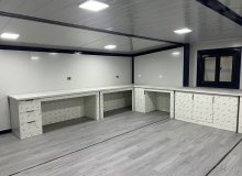 Hurricane-resistant container houses