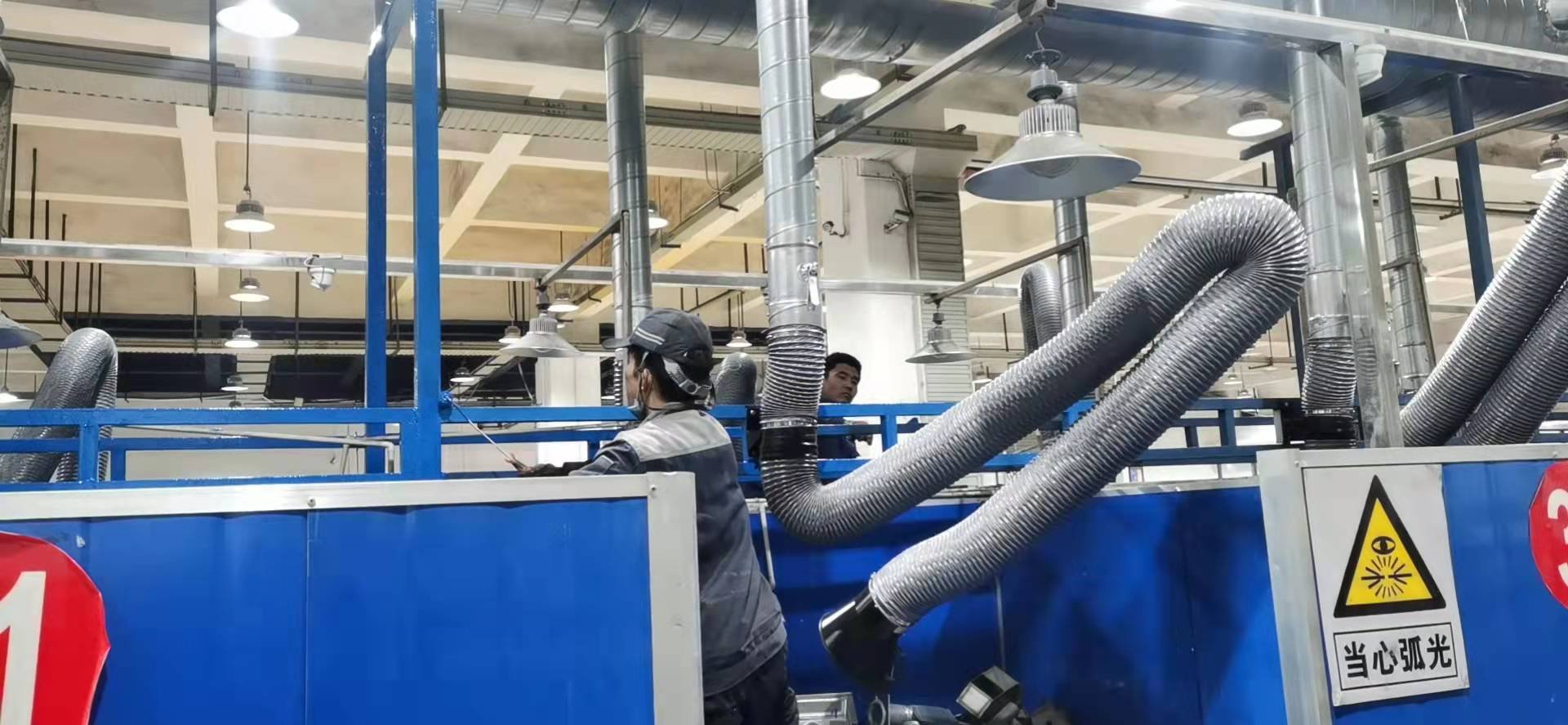 welding extraction arm