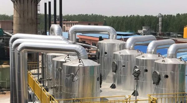 Double quadruple effect evaporator