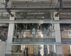 Aluminum electrolyte lithium extraction single-effect evaporator system
