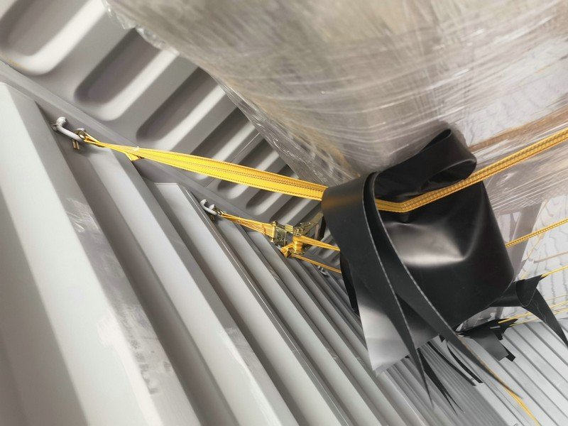 Protective packing materials securing NAVISOUL boat