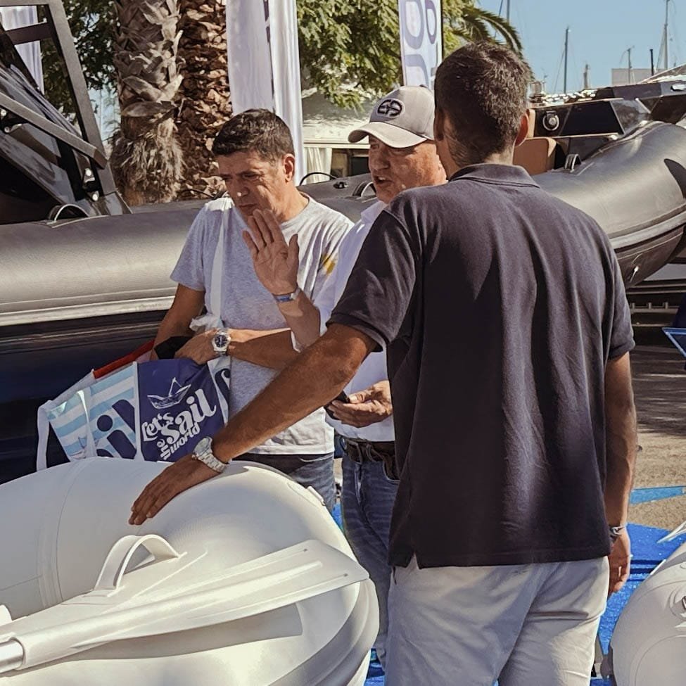 Local distributor engaging with visitors and answering their questions at our booth during the Barcelona exhibition.